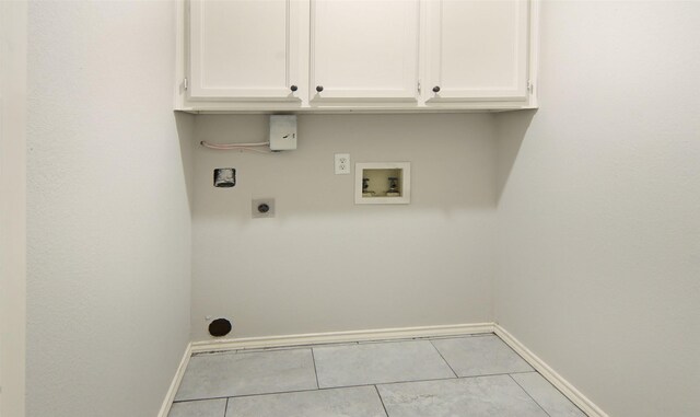 602 Valleyridge Ct, Decatur, TX 76234 - laundry room featuring hookup for an electric dryer, hookup for a washing machine, baseboards, and tile patterned floors