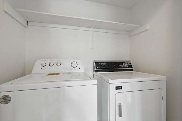 4448 Wind River Ln, Garland, TX 75042 - laundry room with independent washer and dryer