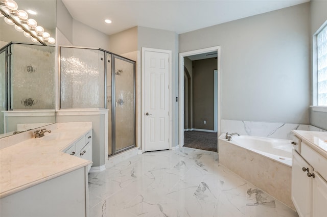 4145 Victory Dr, Frisco, TX 75034 - full bathroom with vanity, marble tiled flooring, a bath, a stall shower, and baseboards