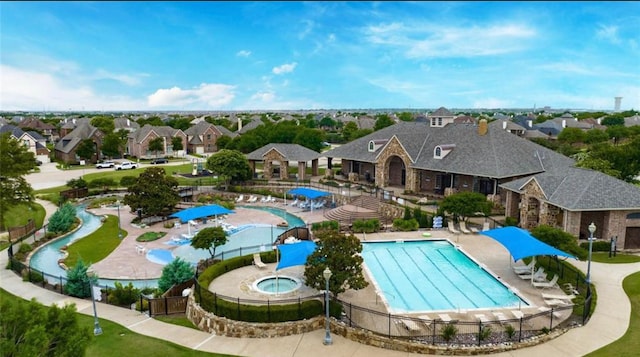 4145 Victory Dr, Frisco, TX 75034 - community pool with a community hot tub, a patio, and a residential view