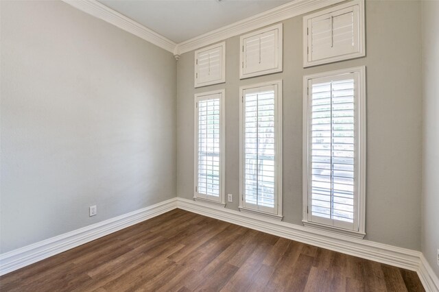 4145 Victory Dr, Frisco, TX 75034 - spare room featuring dark wood-style flooring, crown molding, baseboards, and healthy amount of natural light
