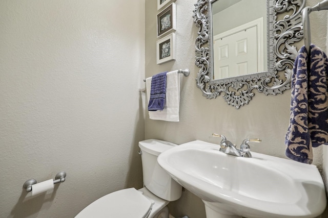 5603 Blazing Star Rd, Frisco, TX 75036 - bathroom with toilet and a sink