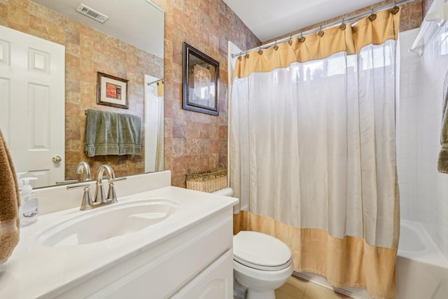 5603 Blazing Star Rd, Frisco, TX 75036 - full bathroom featuring tile walls, toilet, shower / bath combo, and vanity