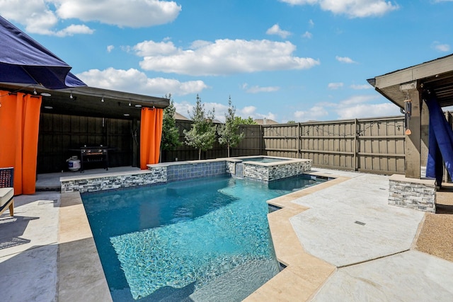 5603 Blazing Star Rd, Frisco, TX 75036 - view of swimming pool with a patio, a fenced backyard, and a pool with connected hot tub