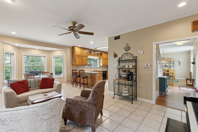 7632 Westwind Dr, Fort Worth, TX 76179 - living area featuring light tile patterned floors, ceiling fan, baseboards, and recessed lighting