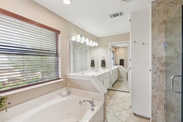 7632 Westwind Dr, Fort Worth, TX 76179 - bathroom featuring a stall shower, a jetted tub, tile patterned floors, and vanity