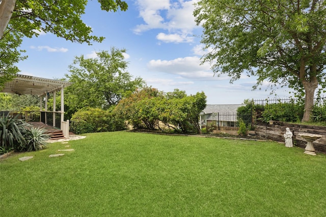 7632 Westwind Dr, Fort Worth, TX 76179 - view of yard featuring a wooden deck and a pergola
