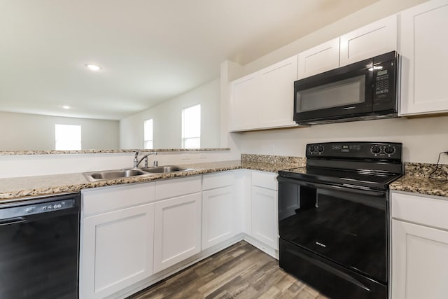 330 Flagship Ln, Gun Barrel City, TX 75156 - kitchen with black appliances, a sink, white cabinetry, wood finished floors, and recessed lighting