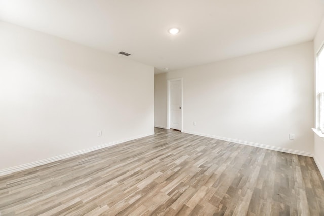 330 Flagship Ln, Gun Barrel City, TX 75156 - spare room with light wood-type flooring and baseboards