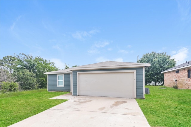 330 Flagship Ln, Gun Barrel City, TX 75156 - view of front of property with a garage, a front yard, and an outbuilding