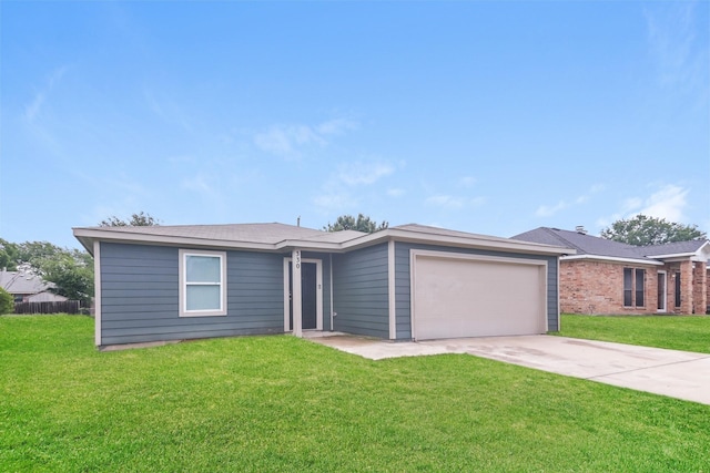 330 Flagship Ln, Gun Barrel City, TX 75156 - view of front of home with an attached garage, driveway, and a front yard