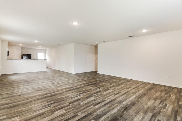 330 Flagship Ln, Gun Barrel City, TX 75156 - unfurnished living room featuring dark wood finished floors, recessed lighting, and baseboards