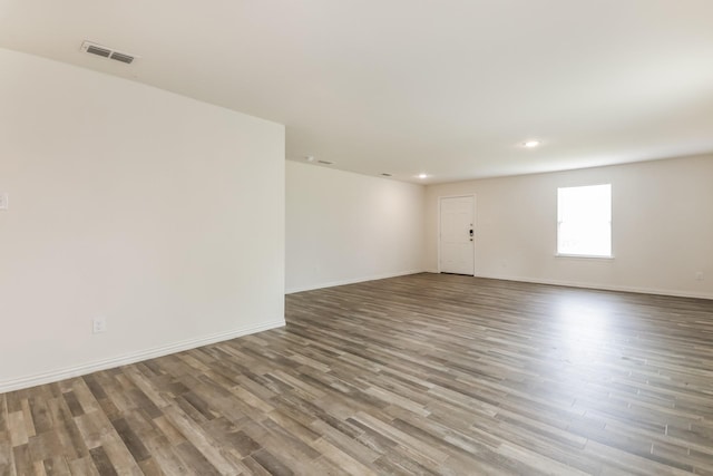 330 Flagship Ln, Gun Barrel City, TX 75156 - unfurnished room with wood finished floors, recessed lighting, and baseboards