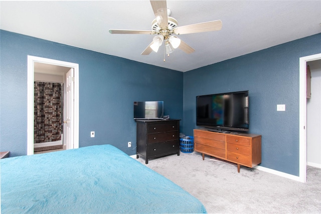 1011 Liffey Dr, Pflugerville, TX 78660 - bedroom featuring carpet floors, baseboards, and ceiling fan