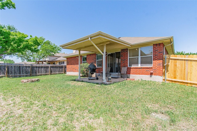 1011 Liffey Dr, Pflugerville, TX 78660 - back of house with brick siding and a patio area