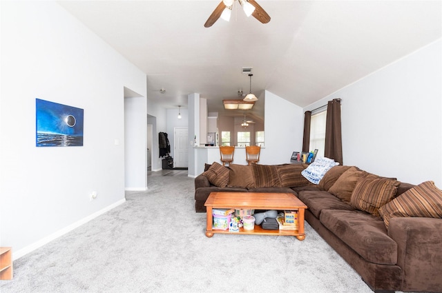 1011 Liffey Dr, Pflugerville, TX 78660 - living area with a ceiling fan, baseboards, carpet floors, and vaulted ceiling