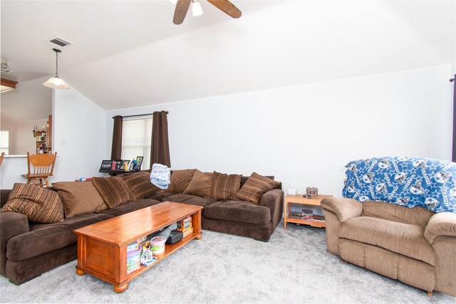 1011 Liffey Dr, Pflugerville, TX 78660 - living area with carpet, ceiling fan, plenty of natural light, and vaulted ceiling
