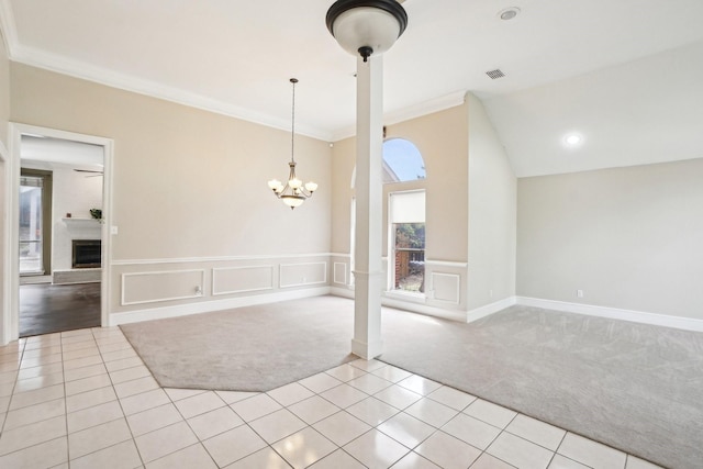 612 Christan Ct, Rockwall, TX 75087 - spare room featuring light colored carpet, a chandelier, light tile patterned floors, and crown molding