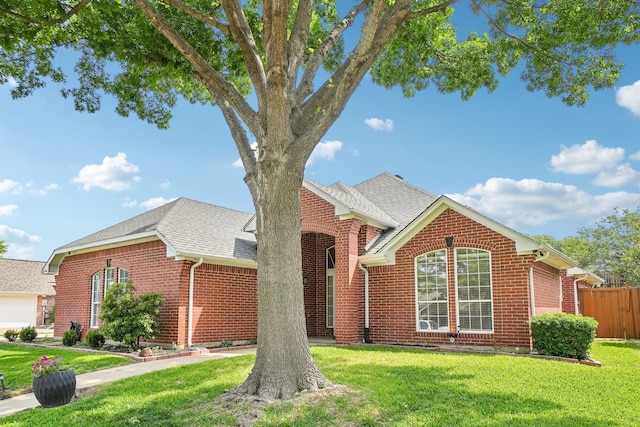 612 Christan Ct, Rockwall, TX 75087 - view of front of property with brick siding and roof with shingles