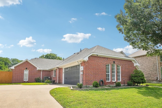 612 Christan Ct, Rockwall, TX 75087 - view of front of property featuring brick siding, concrete driveway, a garage, and roof with shingles
