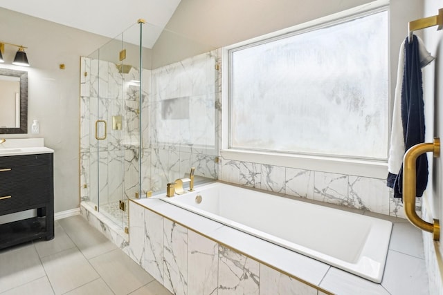 612 Christan Ct, Rockwall, TX 75087 - full bath featuring a marble finish shower, vanity, a garden tub, vaulted ceiling, and tile patterned flooring