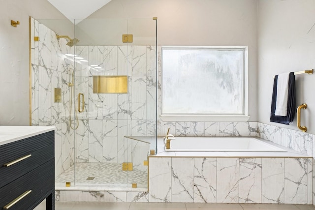 612 Christan Ct, Rockwall, TX 75087 - bathroom featuring a marble finish shower, a garden tub, and vanity