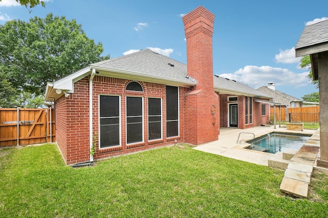 612 Christan Ct, Rockwall, TX 75087 - rear view of property with brick siding, a shingled roof, a patio, and a chimney