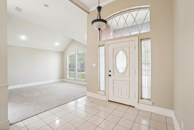 612 Christan Ct, Rockwall, TX 75087 - foyer entrance with light colored carpet, light tile patterned floors, baseboards, lofted ceiling, and recessed lighting