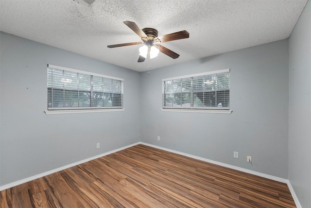 178 Norwood Dr, Woodway, TX 76712 - unfurnished room featuring wood finished floors, ceiling fan, baseboards, and a textured ceiling