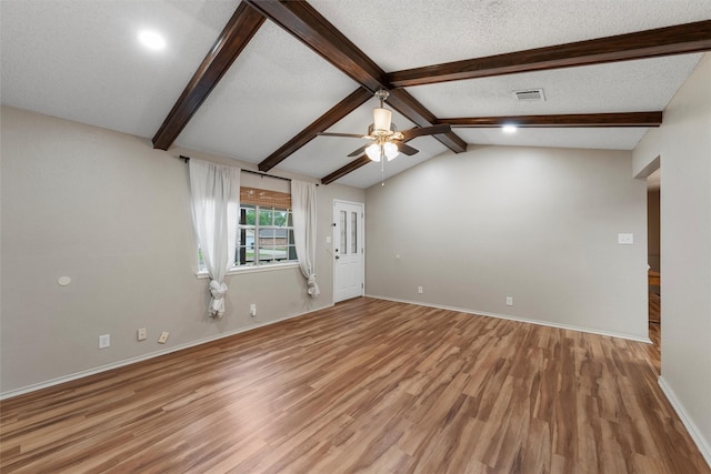 178 Norwood Dr, Woodway, TX 76712 - unfurnished living room featuring ceiling fan, light wood finished floors, baseboards, and a textured ceiling