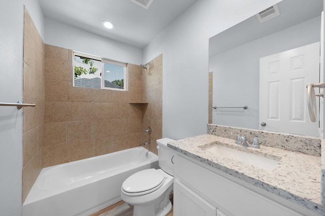 804 Hemlock Dr, West Tawakoni, TX 75474 - bathroom with toilet, shower / bath combination, vanity, and wood finished floors