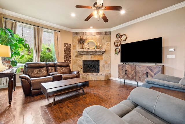 4307 Savannah Ln, Granbury, TX 76049 - living area featuring wood finished floors, crown molding, a ceiling fan, a fireplace, and baseboards