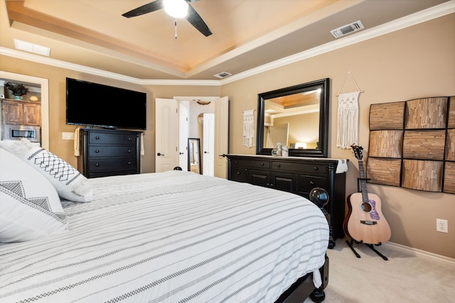 4307 Savannah Ln, Granbury, TX 76049 - bedroom featuring a tray ceiling, light colored carpet, baseboards, crown molding, and a ceiling fan