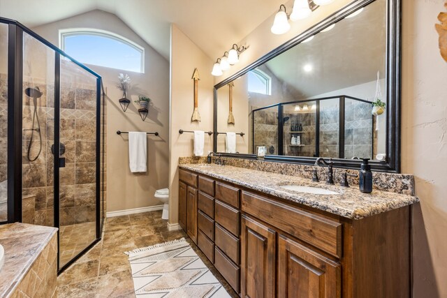 4307 Savannah Ln, Granbury, TX 76049 - full bathroom with lofted ceiling, a stall shower, toilet, double vanity, and baseboards