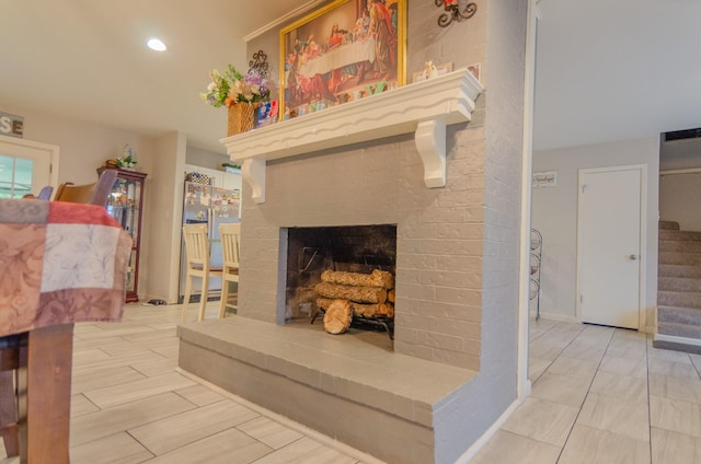 2209 Ridgewood Dr, Sherman, TX 75092 - living area featuring stairway, a brick fireplace, and recessed lighting
