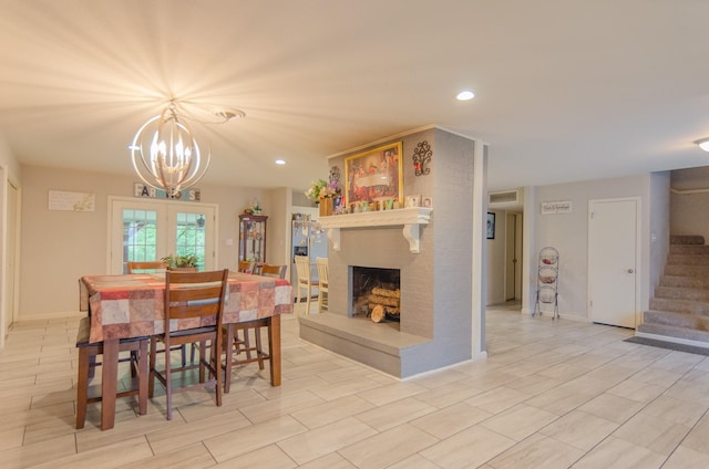 2209 Ridgewood Dr, Sherman, TX 75092 - dining space with stairway, a chandelier, recessed lighting, and a fireplace