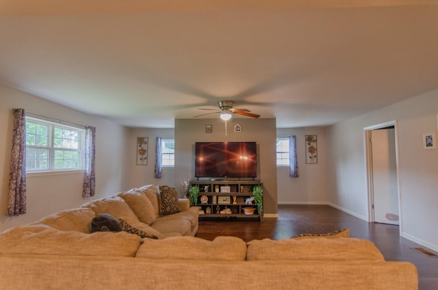 2209 Ridgewood Dr, Sherman, TX 75092 - living area with plenty of natural light, dark wood-style floors, a ceiling fan, and baseboards