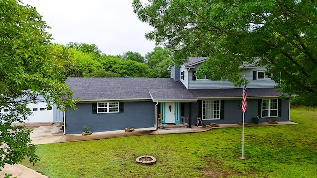 2209 Ridgewood Dr, Sherman, TX 75092 - traditional home featuring a front yard, driveway, roof with shingles, and an attached garage