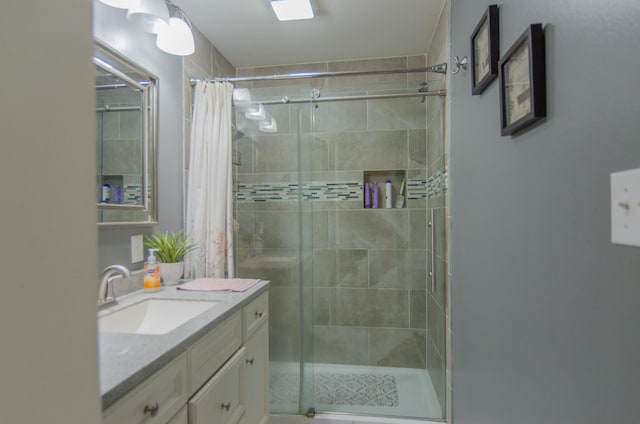 2209 Ridgewood Dr, Sherman, TX 75092 - bathroom featuring a stall shower and vanity