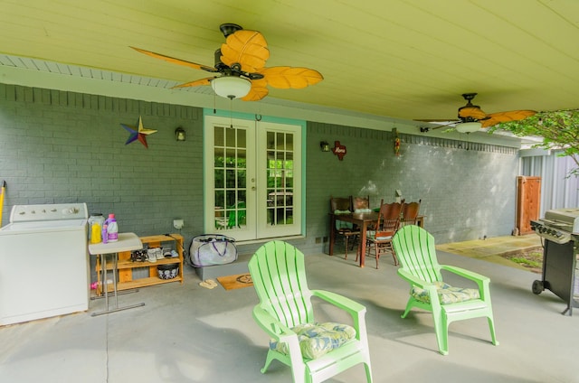 2209 Ridgewood Dr, Sherman, TX 75092 - view of patio / terrace with french doors, washer / clothes dryer, ceiling fan, a grill, and outdoor dining area