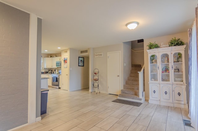 2209 Ridgewood Dr, Sherman, TX 75092 - foyer entrance with stairs, baseboards, and recessed lighting