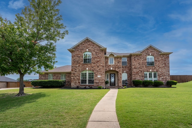 112 Mustang Dr, Fate, TX 75087 - traditional home featuring brick siding and roof with shingles