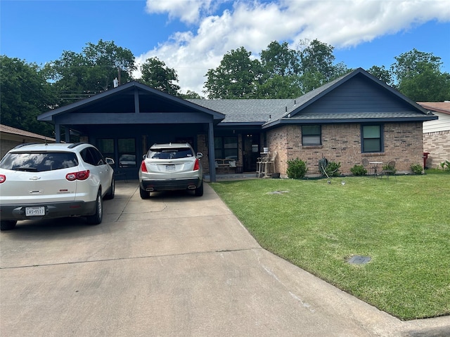 1313 E Turley St, Sherman, TX 75090 - ranch-style house with driveway, a front yard, brick siding, and a shingled roof