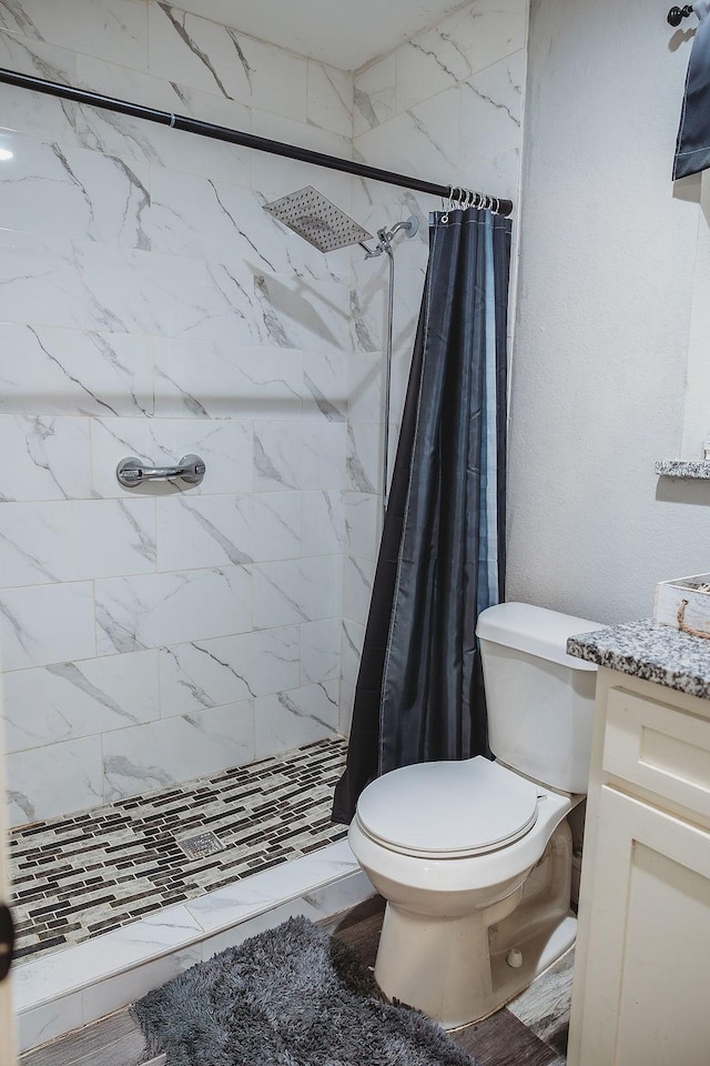 1313 E Turley St, Sherman, TX 75090 - bathroom featuring a shower stall, toilet, and vanity
