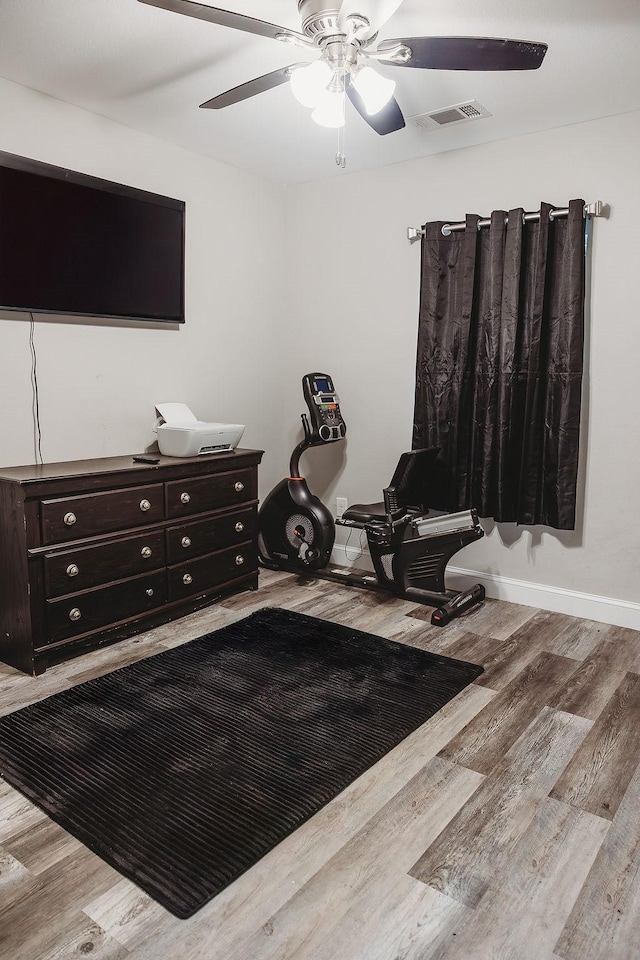 1313 E Turley St, Sherman, TX 75090 - sitting room featuring ceiling fan, wood finished floors, and baseboards