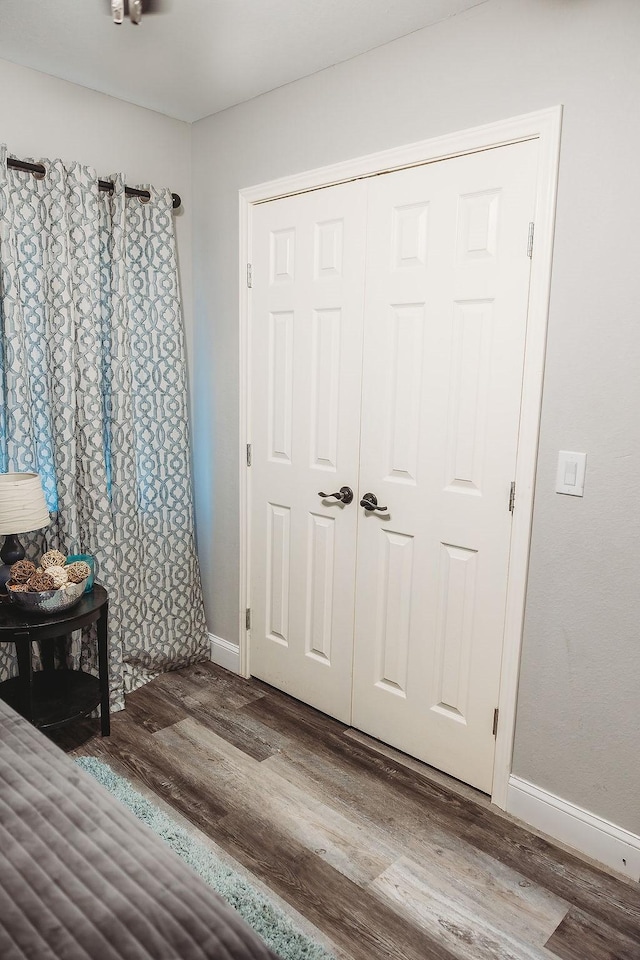 1313 E Turley St, Sherman, TX 75090 - bedroom featuring wood finished floors, baseboards, and a closet