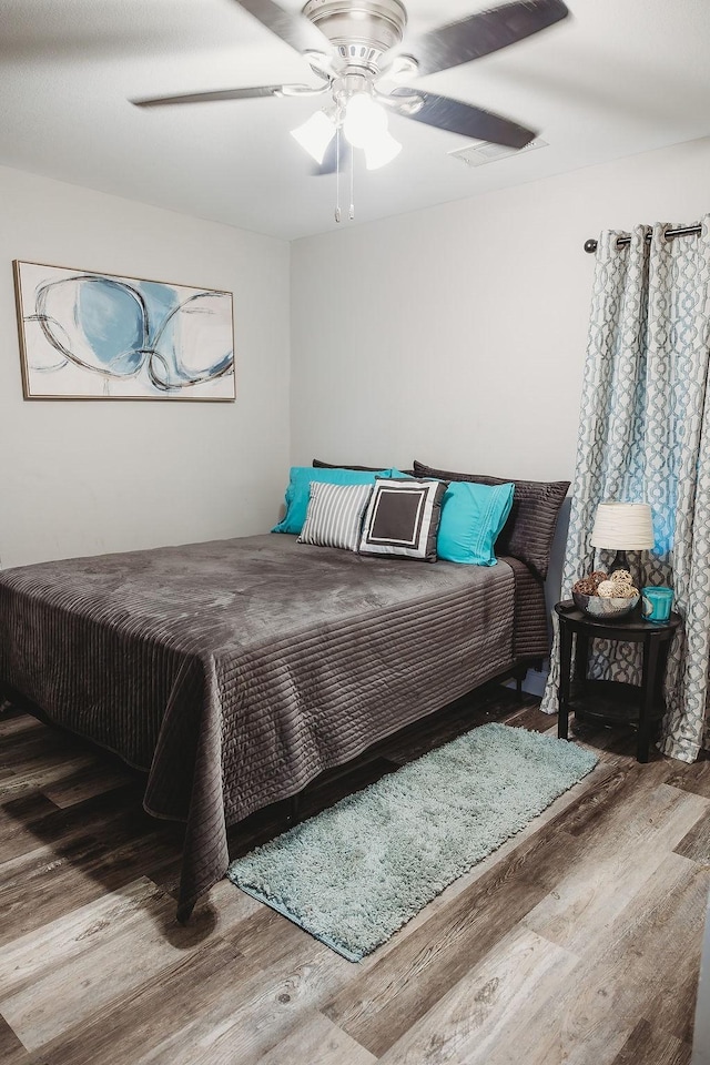 1313 E Turley St, Sherman, TX 75090 - bedroom with wood finished floors and a ceiling fan