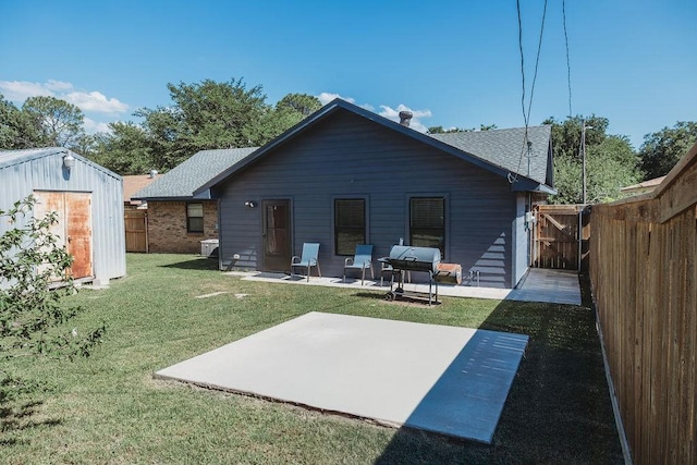 1313 E Turley St, Sherman, TX 75090 - back of house featuring a patio and a shingled roof