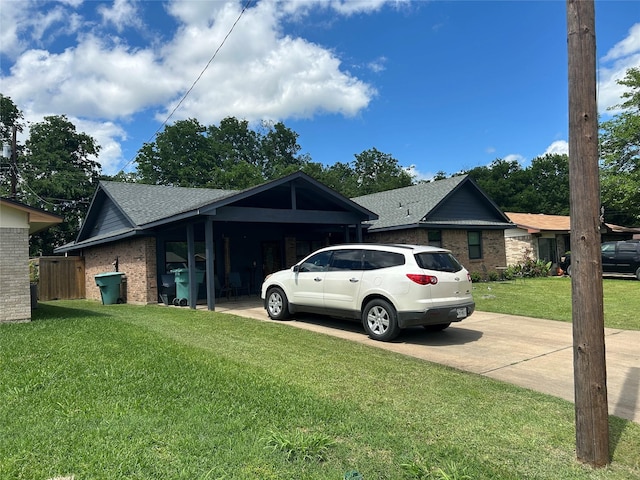1313 E Turley St, Sherman, TX 75090 - view of side of property featuring concrete driveway, brick siding, and roof with shingles