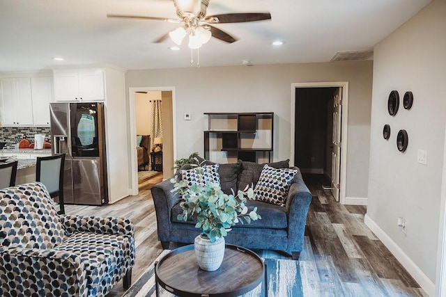 1313 E Turley St, Sherman, TX 75090 - living room with ceiling fan, wood finished floors, baseboards, and recessed lighting